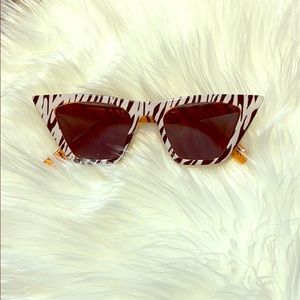 Zebra print “Wild and Free” glasses (Fashion Nova)